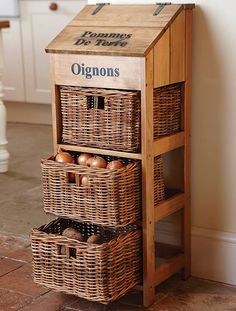 an old fashioned wooden box with baskets on the bottom and two brown eggs in it