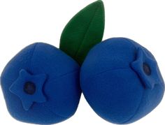 two blue balls with green leaves on them