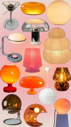 many different colored lamps on a pink background