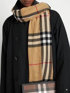 Burberry Monogram Cashmere Scarf Designer's ID: 8035910 Burberry Most Iconic Item, The cashmere Monogram Scarf FROM BURBERRY, featuring fried edges, an Embroidered Leather patch. Color: Archive Beige Measurements: Width: 70cm Length: 210cm Composition: 100% Cashmere Made IN The U.K Monogram Scarf, Burberry Monogram, Monogrammed Scarf, Embroidered Leather, Cashmere Scarf, Leather Patches, Plaid Scarf, Burberry, Cashmere