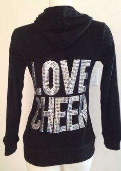 a black hoodie with the words love cheer on it