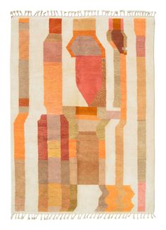 an orange and brown rug with fringes on top of it, in the shape of geometric