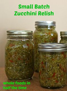 small batch zucchini relish in glass jars on a table with text overlay