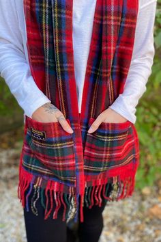 A super functional, cozy and cute winter scarf! This scarf features a plaid print, fringe edges and even has pockets to help keep your hands cozy warm. Plaid, Homemade Gifts, Pocket Scarf, Patchwork Scarf, Pocket Scarves, Plaid Print, Winter Scarf, Plaid Scarf, Red