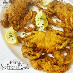 fried soft shell crab served with lemon wedges