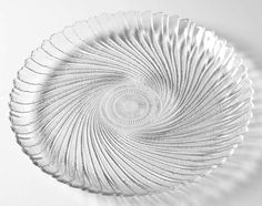 a glass plate with wavy lines on it