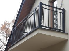 an apartment building with a balcony and balconies