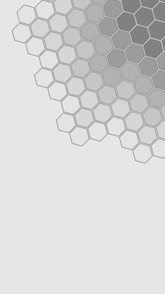 an abstract gray and white background with hexagonal shapes in the center, on top of each other