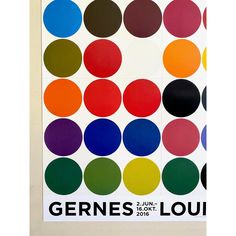 a poster with different colored circles on it's sides and the words gernes louu written in black