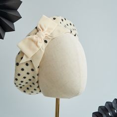 Ivory and black polka dot French beret hat with an ivory velvet ribbon bow. A machine made ivory wool felt beret hat printed with black spots and customised with a handmade ivory velvet ribbon bow.  This ivory spotty beret with a bow is the perfect winter accessory. The velvet ribbon bow is a timeless decoration making this is a classic design, great for wearing every day. This spotty beret is also available with a velvet ribbon bow in the following colours; Black, Dark Pink (Peony), Emerald Gre Velvet Ribbon Bow, Felt Beret, French Beret Hat, Eco Friendly Gift Wrapping, French Beret, Hat Beret, Hat Print, Ribbon Hair Bows, Pink Peony