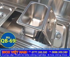 stainless steel sink with two deep dishes in the middle and an ad for nox viet nam