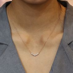 This classic yet unique diamond necklace is crafted in a lustrous 14k rose gold curved cluster pendant creating an eye-catching and chic look. The 7 white diamond pendant hangs gorgeously from a solid 14k rose gold cable chain. The length of the gold chain can be adjusted to either 16" or 18" long to suit your style! Adore her with this diamond drop pendant that can be made in your choice of white, rose, or yellow gold. ** The listing price is for one diamond necklace Availability: Ready to Ship Simple Unique Necklace, Luxury Delicate Round Pendant Diamond Necklace, 5 Stone Diamond Necklace, Gold Chain Design With Pendant, Rose Gold Chain With Pendant, New Chain Designs Gold, Cluster Diamond Necklace, Classic Diamond Necklace, Minimal Diamond Necklace