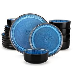 blue and black dinnerware set on white background