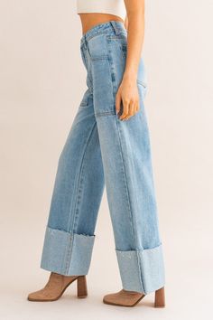 High-waisted, cuffed jeans with an elongating fit! These are a light wash denim with statement pockets along the front side. Relaxed fit, we recommending sizing down one size for a tighter fit. Model is 5’8” wearing size small. Ankle length Cuffed hem Light wash 100% cotton Size guide (in inches): XS: Waist 13.0 (Waist), Hips 18.0, Inseam 30.5, Length 41.5 S: Waist 13.5, Hips 18.5, Inseam 31.0, Length 42.0 M: Waist 14.0, Hips 19.0, Inseam 31.5, Length 42.5 L: Waist 14.5, Hips 19.5, Inseam 32.0, High Cuffed Jeans, Cuffed Jeans, Leg Cuffs, European Summer, Relaxed Fit Jeans, Light Denim, Fashion Model, Sheer Fabrics, Print Pattern