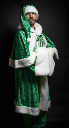 GET IT IN TIME FOR CHRISTMAS                FULL TRACKING  UNIQUE SANTA SUIT FATHER CHRISTMAS  CUSTOM MADE      FLARED  ROBE IN CRUSHED VELVET  WITH WHITE FUR EDGING FOR FANCY DRESS, THEATRE PRODUCTIONS ETC. FRONT OPENING JACKET. length approx 45" Jacket. (Or contact us for bespoke sizes) LARGE  HOOD PAIR OF LOOSE FITTING VELVET TROUSERS  INCLUDED WITH ELASTIC WAIST  IF YOU REQUIRE A FULL LENGTH ROBE PLEASE CHECK OUT MY OTHER LISTINGS.  THIS IS FOR A JACKET AND TROUSERS. and hat please provide a phone number and email address in custom options for courier shipping , this enables courier to contact you directly if theres a problem deliveringalthough I do not accept returns I am happy to exchange when size is not correct Although my turnaround is 2-5 weeks depending on orders if you need for Irish Santa, Father Xmas, Xmas Elf, Santa Suit, Santa Suits, Christmas Custom, Velvet Trousers, Irish Celtic, White Fur