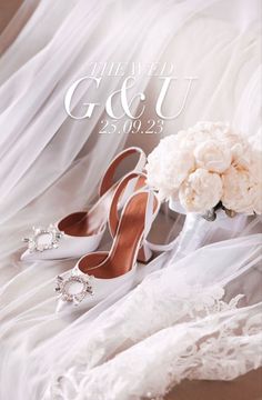 the wedding shoes and bouquet are on display