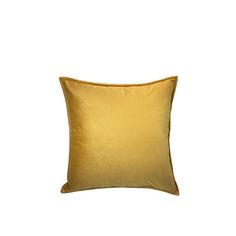 a gold pillow on a white background