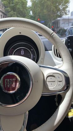 the steering wheel and dashboard of a car