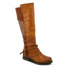 a woman's brown boots on a white background