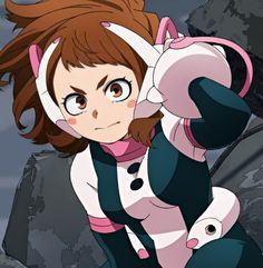 an anime character with brown hair and blue eyes is posing in front of some rocks