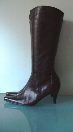 These boots are in excellent condition.  They are clean inside and out.  Wonderful lizard accents up the back and around the top. Just gorgeous and so fierce! Measures  Insole 9.5" Height from floor 16.5" Heel 3" Circumference at top 14.5" Please measure carefully and feel free to ask more questions regarding size and condition as there are no refunds or exchanges. Lot 2 r-5 Brown Boots Aesthetic, Boots Aesthetic, Navy Blue Pumps, Dark Brown Boots, Hooded Wool Coat, Blue Pumps, Vintage Boots, Toe Boots, Leather Clutch Bags