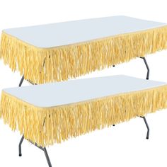 two tables with yellow fringes on them