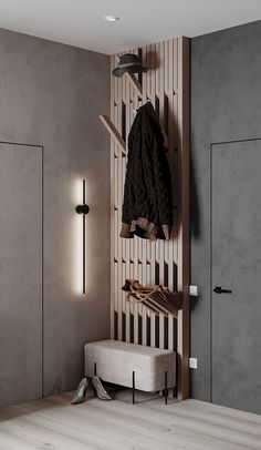 a coat rack in the corner of a room with a bench and lights on it