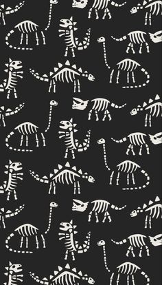 a black and white pattern with skeletons on it