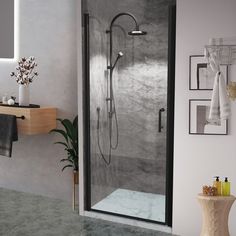 a bathroom with a walk in shower next to a bathtub and towel rack on the wall