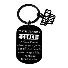 a black keychain with the words coach and an image of a thank you for all you do