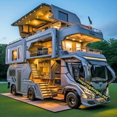 a bus that has been designed to look like a house with stairs on the roof