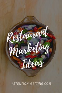 a wooden bowl filled with colorful vegetables and the words restaurant marketing ideas on top of it