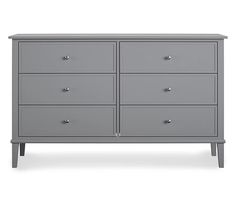 a grey dresser with six drawers