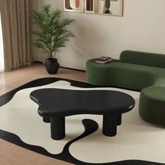 a black and white rug in a living room