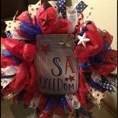 a patriotic wreath with the words usa freedom on it