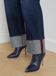 An ultra-high-rise cuffed wide-leg jean in premium all-cotton denim. True-blue wash with subtle high-low contrast and discrete distressing. Design comfortably hugs from just above natural waist through hip before draping into a wide flared leg that ends in a deep fold-up cuff. Contrast topstitching highlights five-pocket construction and zip fly closure. 100% Cotton. | L'AGENCE Miley Jean In Denmark High End Denim Fashion, Big Cuff Jeans, Wide Cuff Jeans Outfit, Wide Cuff Jeans, Cuff Jeans, Contrast Topstitching, Denim Projects, Fashion Themes, Cuffed Jeans