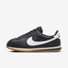 You spoke. We listened. Based on your feedback, we've revamped the original Cortez while maintaining the retro appeal you know and love. This version has a wider toe area and firmer side panels, so you can comfortably wear them day in and day out without any warping. Cortez fans—this one’s for you. Nike Retro Leather Sneakers, Retro Nike Leather Sneakers, Nike Retro Black Sneakers, Classic Black Sneakers With Rubber Toe Cap, Vintage Leather Sneakers With Rubber Heel Cap, Classic Black Sneakers With Gum Sole, Modern Black Sneakers With Rubber Toe Cap, Retro Black Sneakers With Gum Sole, Retro Black Leather Sneakers