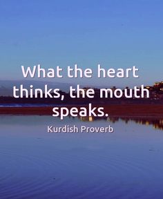 a lake with the words what the heart thinks, the mouth speaks kurdsh prove