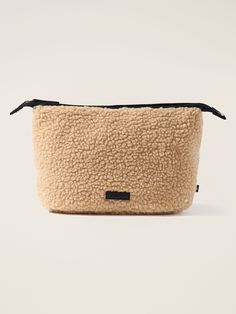 FOR: Commuting, work, and travel FEEL: Fluffy, functional shearling is plush-to-touch and easy to clean FAVE: Use as a cold-weather clutch or cozy travel-friendly organizer Large Pouch Dimensions: 13” L x 7 1/2” H x 5” D. Rich Girl Fashion, Cozy Travel, Mom Gift Guide, Athletic Accessories, Work And Travel, Winter Boho, Large Pouch, Back To School Shopping, Accessories Collection