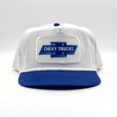 "Chevy Trucks 80s/90s retro 2-tone trucker rope snapback hat with a Vintage Chevy/Chevrolet Trucks Patch \"Chevy Truck Boy\" * Royal Blue/White * One Size Fits Most * 5-Panel Cotton Twill, 2-Tone * High Profile, 3 ¾\" Structured Crown * Cotton Twill * Half-Moon * Snapback Closure **We try to provide every angle in the pictures so please read the description carefully of product listing, size, & fit description & measurements. Also please ask any questions about sizing prior to ordering if you are concerned. Follow us on IG for new items & updates @goodboyhat" Vintage Chevrolet, Spring Board, Vintage Chevy, Casual Country Outfits, Vintage Trucker Hats, Retro 2, White Rope, Graffiti Characters, Chevy Chevrolet