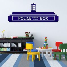 there is a police box sign on the wall in this children's playroom