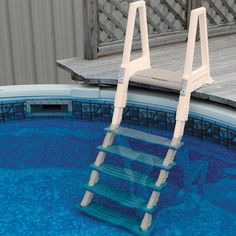 an above ground swimming pool with a ladder