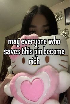 a girl holding a hello kitty pillow with the caption, may everyone who saves this pin become rich