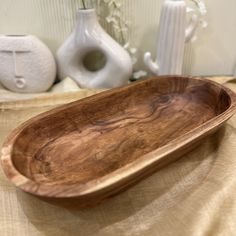 Indulge in the timeless charm of our handcrafted wood bowls. Whether you need a serving bowl, salad bowl, or a centerpiece for your living room or kitchen, our hand-carved wooden bowls are the perfect choice.  Crafted with care from natural wood, these bowls make an ideal gift for housewarmings, birthdays, or any occasion. Explore the beauty of handcarved wood and discover the perfect bowl for your needs today! -------------------------------------------- Dimensions- Top Diameter: 22 Inches Base Wooden Dough Bowl Fall Decor, Dough Bowl Fall Decor, Rustic Wood Bowl, Hand Carved Wooden Bowls, African Pottery, Carved Bowl, Carved Wooden Bowl, Wooden Dough Bowl, Dining Table Centerpiece