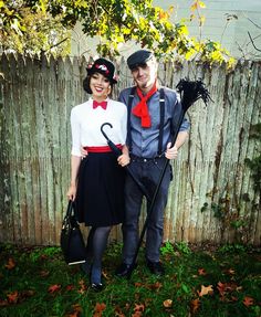 a man and woman dressed up in costumes