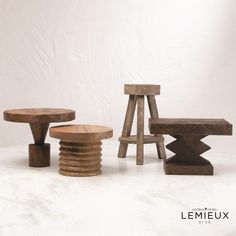 three wooden stools and two tables on a white background with the words lemieex written below them