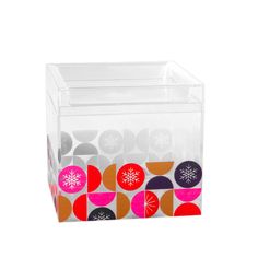 a clear box with colorful circles and snowflakes on it