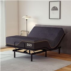 an ego mattress on a bed frame in a living room