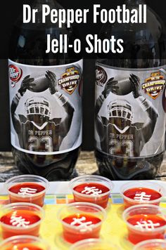 two bottles of pepper football jell - o shots sitting next to each other