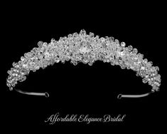 Princess Crystal Wedding Tiara This classic and dazzling tiara is a headpiece that will add lots of sparkle to your wedding day! With a beautiful princess peak, this silver plated tiara features brilliant crystals and clear cut rhinestones, adding a fabulous touch to your bridal hairstyle! Size: 15 1/2" Total Band Length, 8 1/2" Design Length, 1" Design Height. Color: Silver. Style: hp6566. Stunning! Please allow about a week for delivery. Shipping Policy . Return Policy. Fingertip Wedding Veils, Crystal Wedding Tiaras, Wedding Halo, Crystal Wedding Jewelry, Crystal Bridal Tiaras, Beautiful Tiaras, Rhinestone Tiara, Bridal Hairstyle, Beautiful Princess